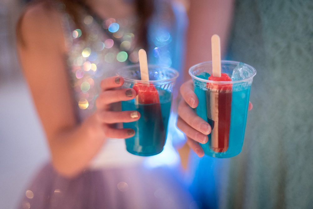 Two popsicle sodas at a festive party