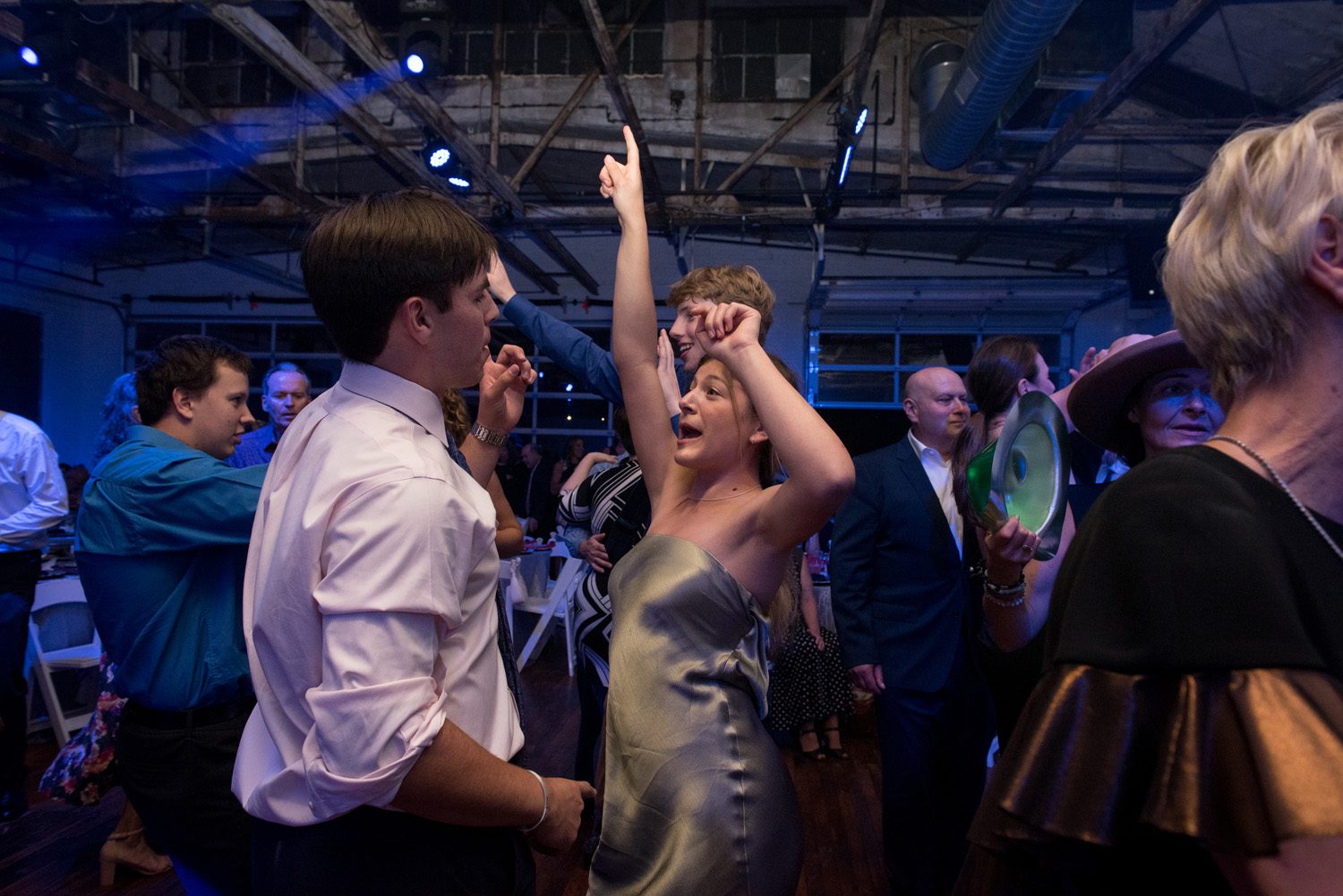 Two young adults dancing on the dance floor at a connecticut bat mitzvah